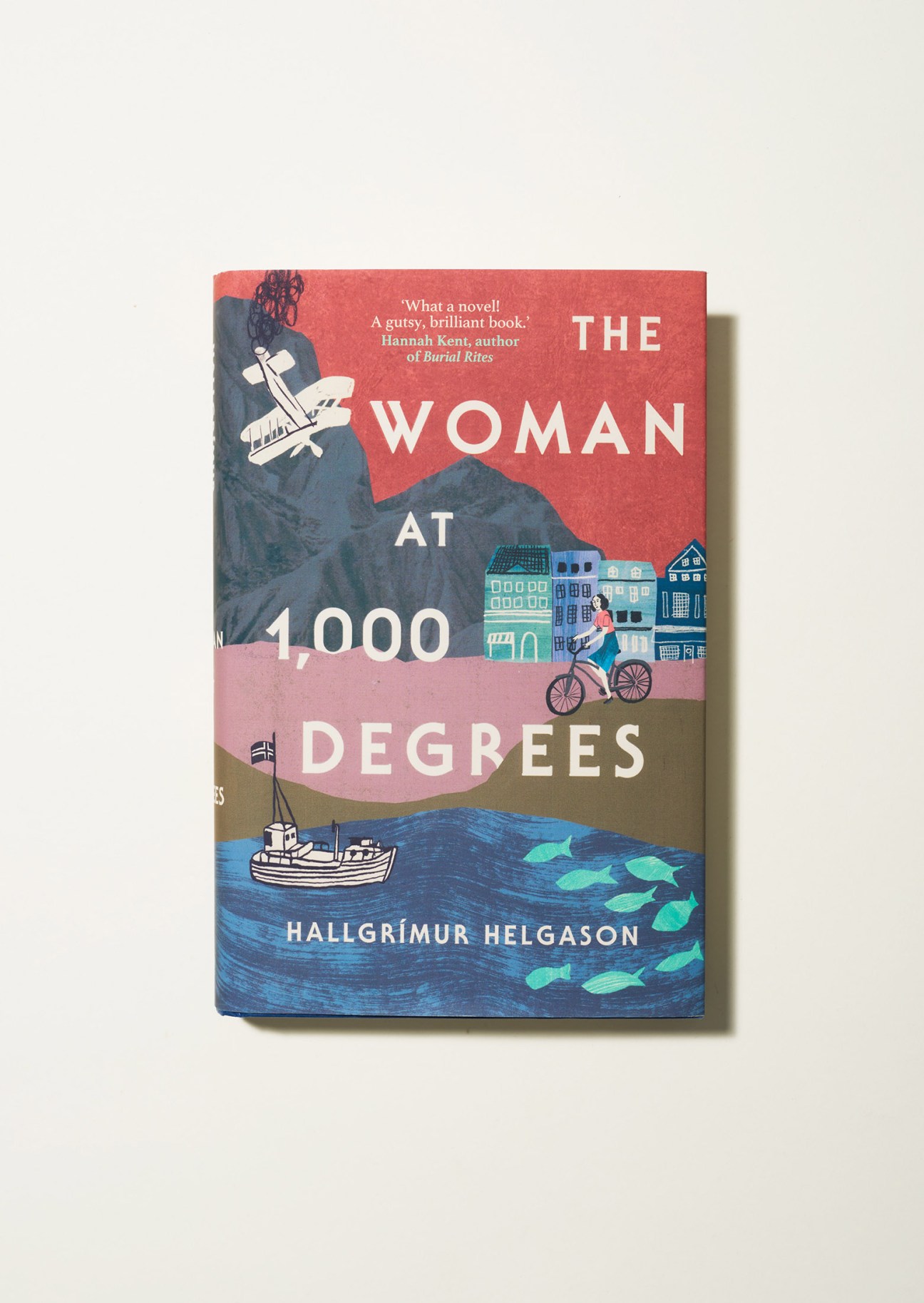 Book cover of The Woman at 1,000 Degrees by Hallgrímur Helgason featuring illustrated scenes.