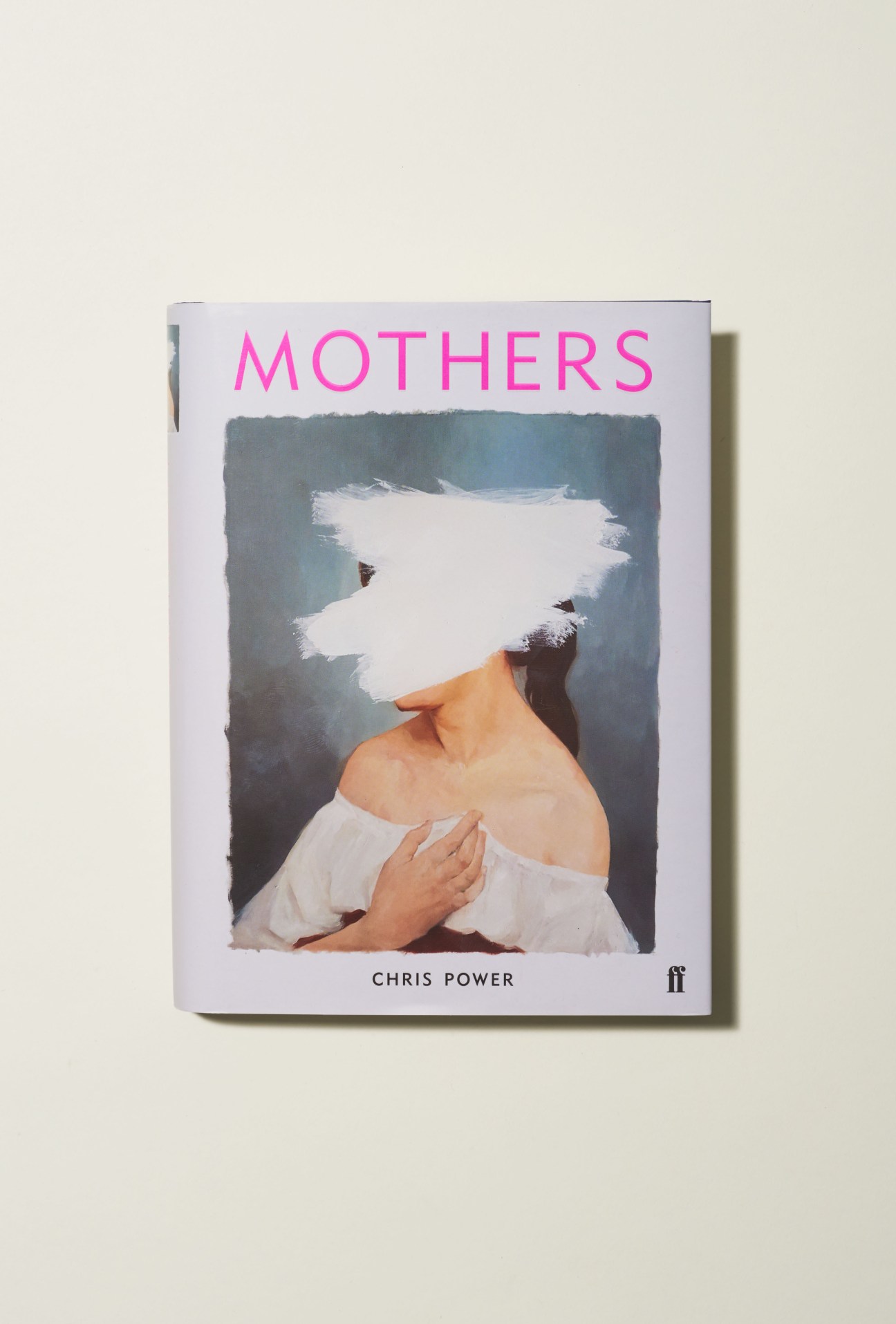 Book cover of 'Mothers' by Chris Power published by Faber, featuring a woman with her face obscured by white paint against a dark background.
