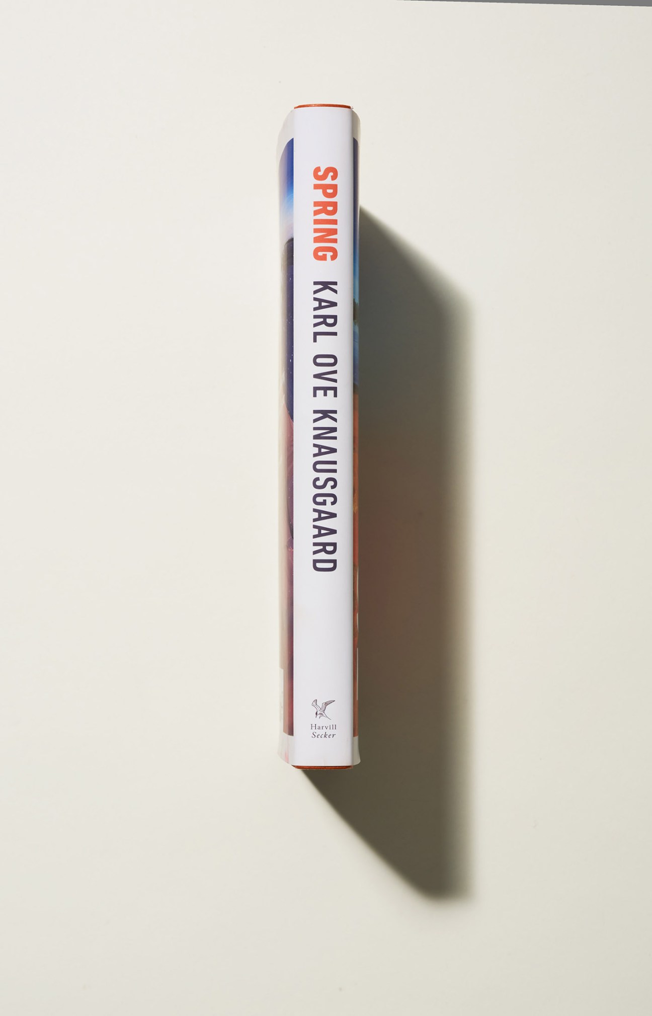 Spring by Karl Ove Knausgaard book spine displayed against white background.