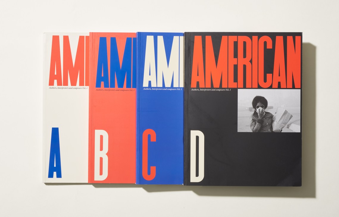 Four volumes of American A, B, C, D book series with bold colored typography spines