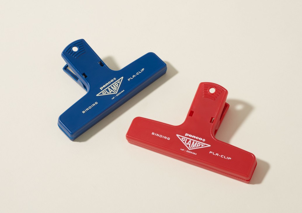 Two colorful paper clips in blue and red from Hightide's Clampy range.
