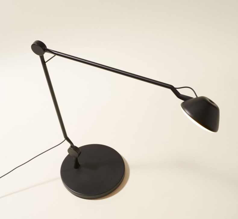 Black matte desk lamp by Anne Qvist for Fritz Hansen with curved arm and dimmable glow.