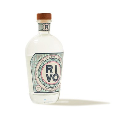 Bottle of Rivo gin with decorative label featuring a circular design and wooden cork.