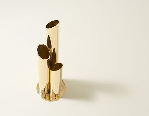 Brass vase with geometric disc-shaped cutouts by Skultuna.