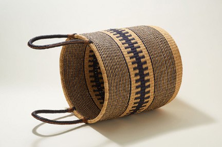 Hand-woven elephant-grass basket with leather handles from SCP.