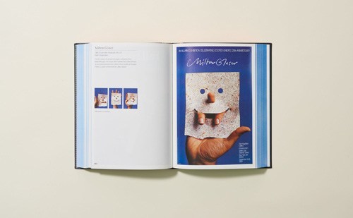 Open book showing Milton Glaser poster designs and typography examples.