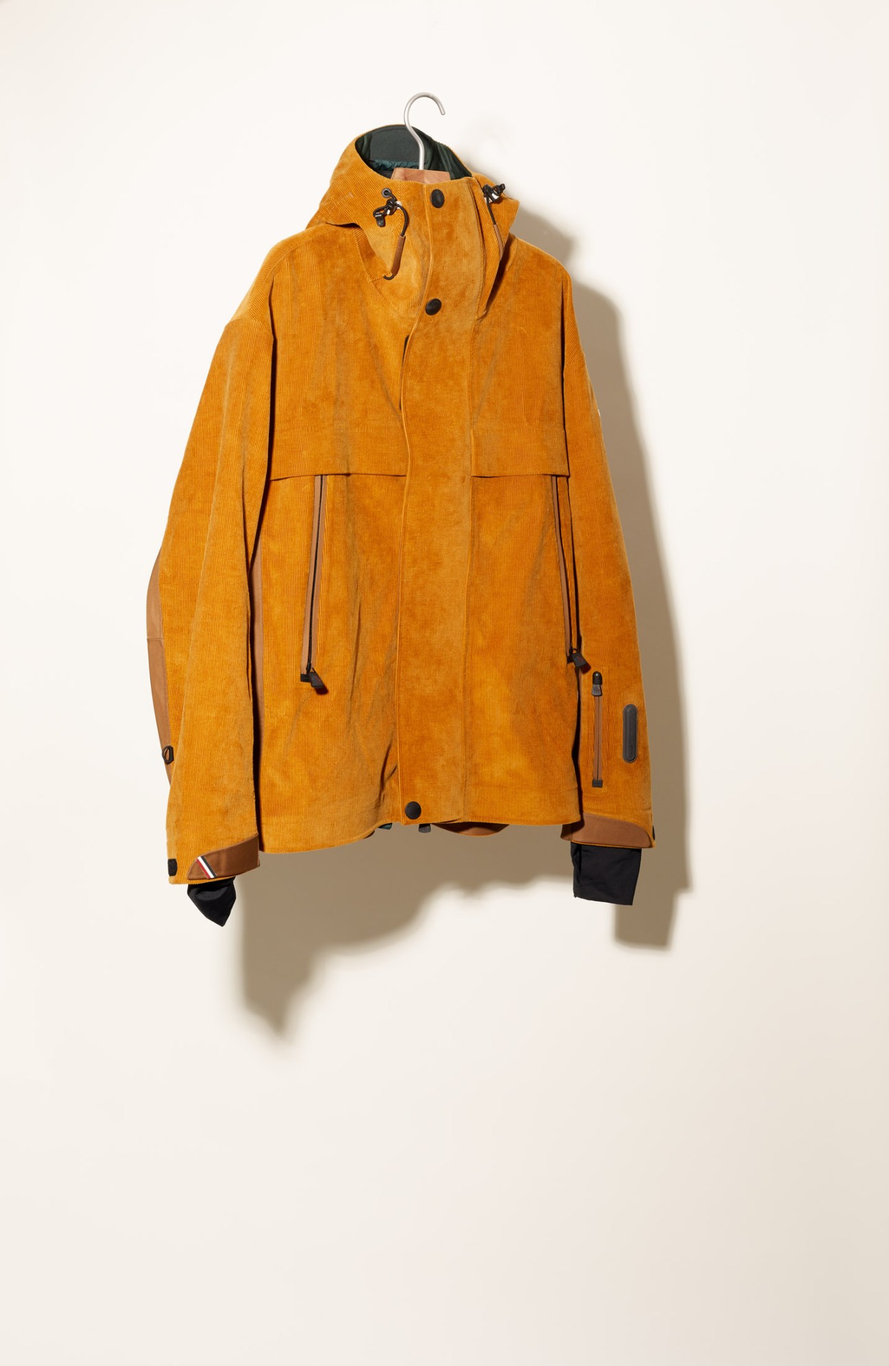 Moncler velvet ski jacket in black displayed on a hanger