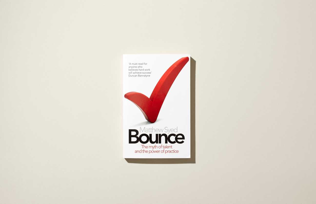Cover of Bounce by Matthew Syed featuring a large red checkmark against a white background.