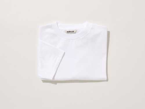 Auralee Luster Plaiting Tee in white, folded on neutral background
