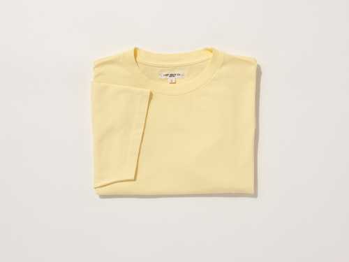 Lady White Co pale yellow Lite Jersey T-shirt folded on white background
