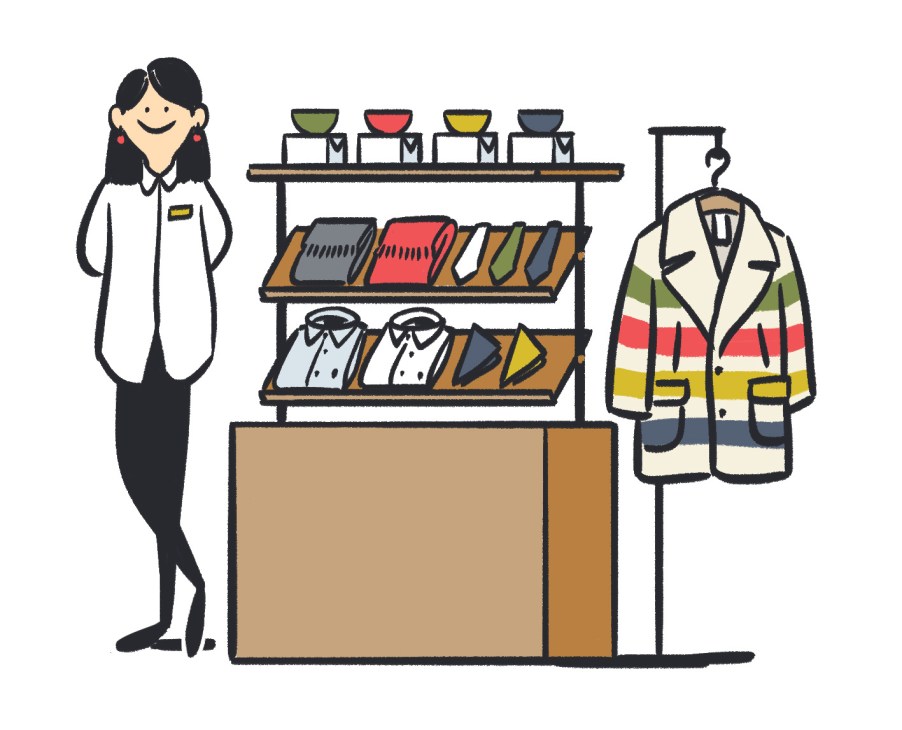 Illustration of a woman shopkeeper standing in front of shelves displaying bowls, ties, scarves and a colorful striped jacket.