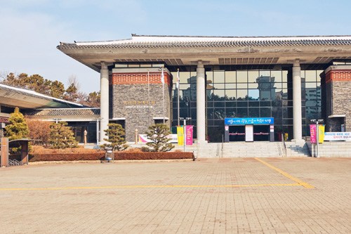 Exterior of Gwangju Folk Museum, South Korea's largest state-run museum, with modern architecture and brick facades.