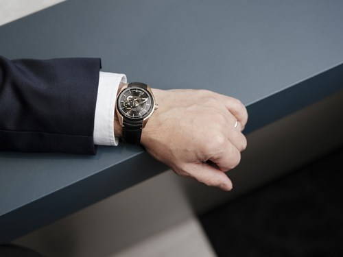 Ulysse Nardin Freak X watch with skeleton dial worn on wrist with white shirt cuff