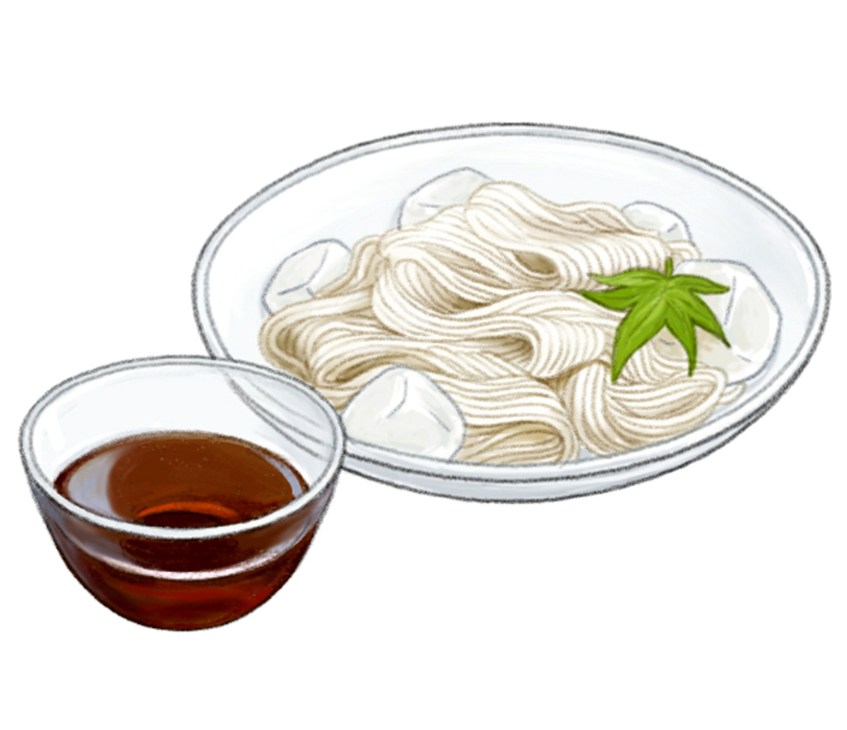 A bowl of thin white somen noodles served with dipping sauce