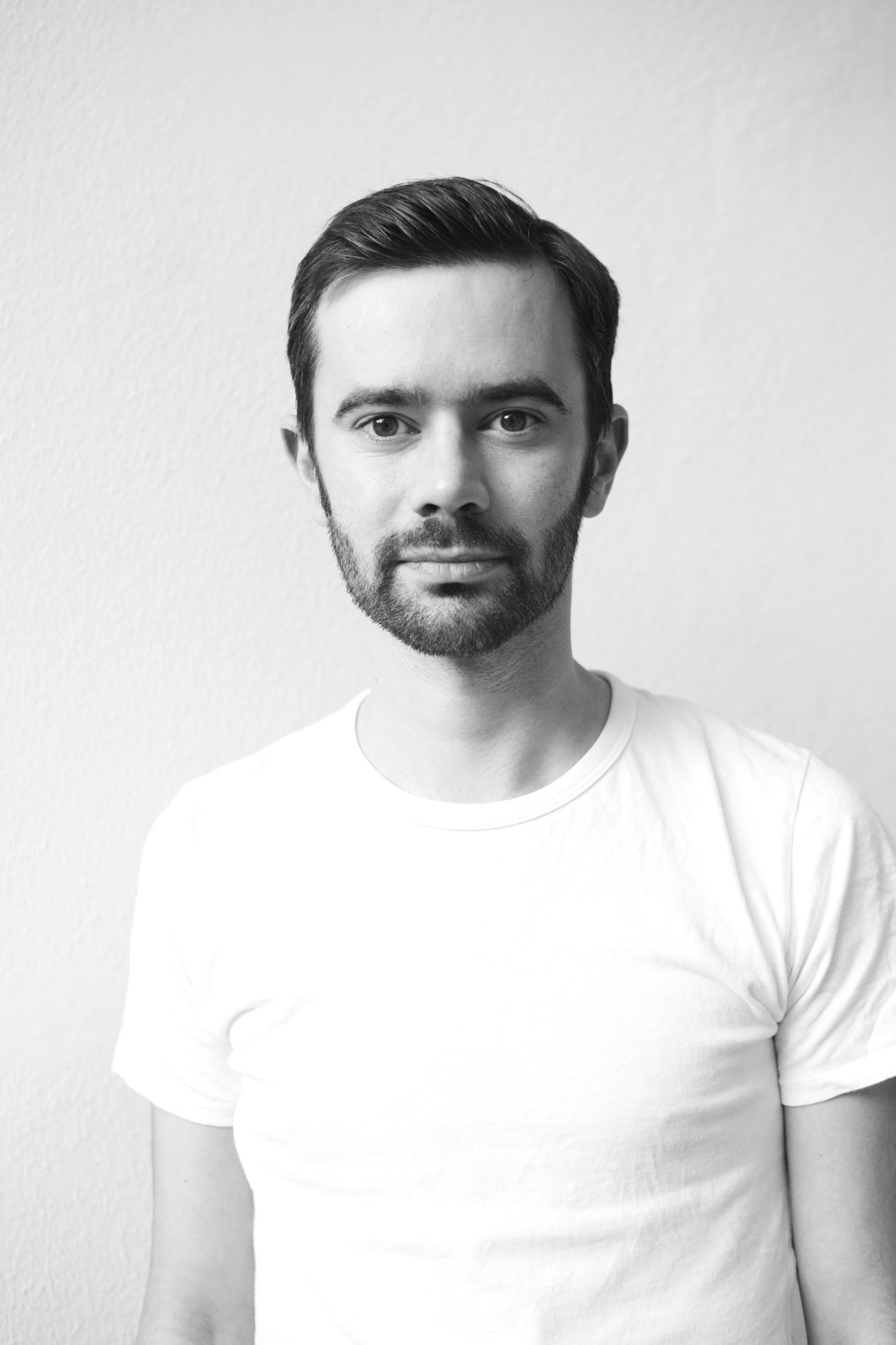 Black and white portrait of Steve Bloomfield, Monocle's foreign editor.