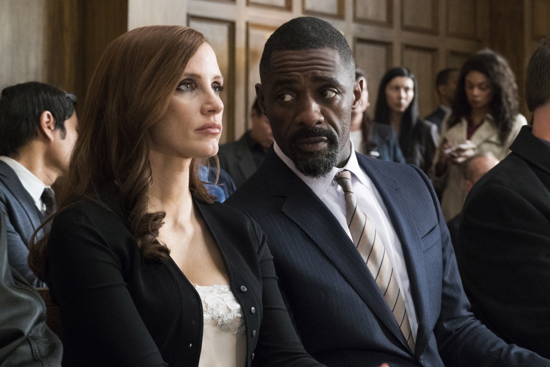 Film still from Molly's Game featuring Jessica Chastain as Molly Bloom in a courtroom scene
