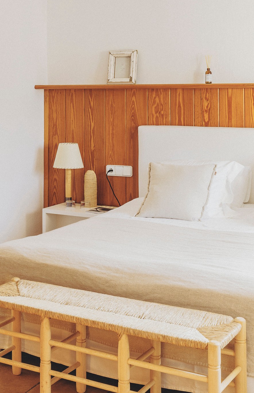 Guest bedroom at Casa Nereta featuring mid-century design elements and Mediterranean styling