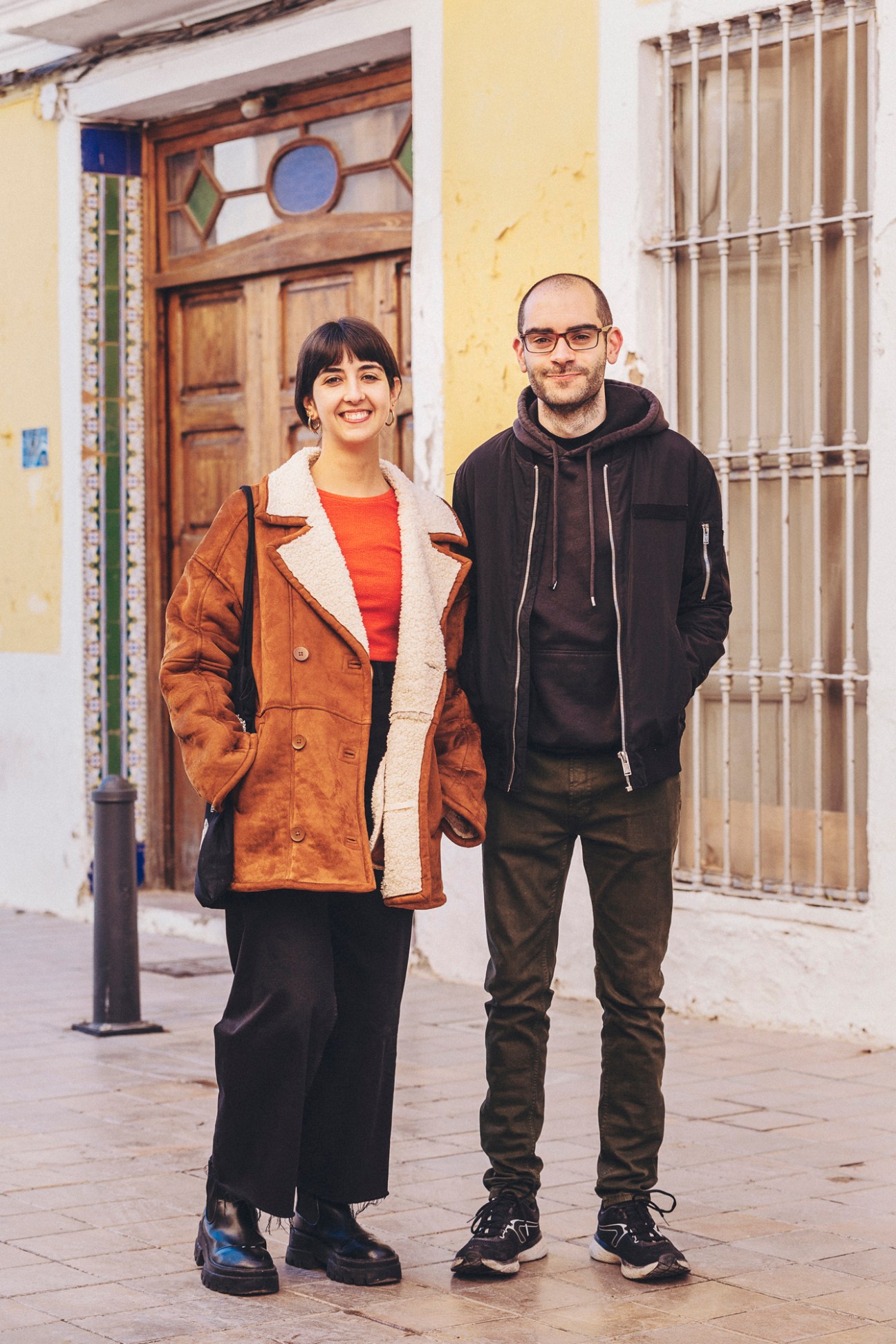 Two local residents, Eva and Antoni, standing together in the main plaza of Benimaclet