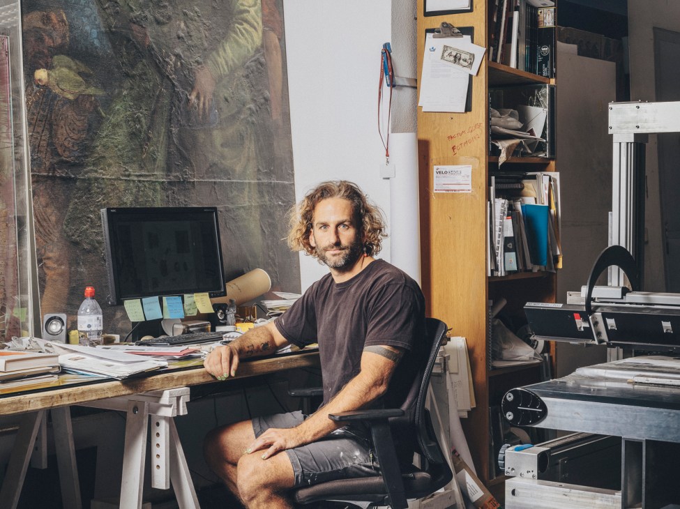 Rafa Rachewsky, head of printing at Factum Arte, sitting at his desk in the Madrid workshop