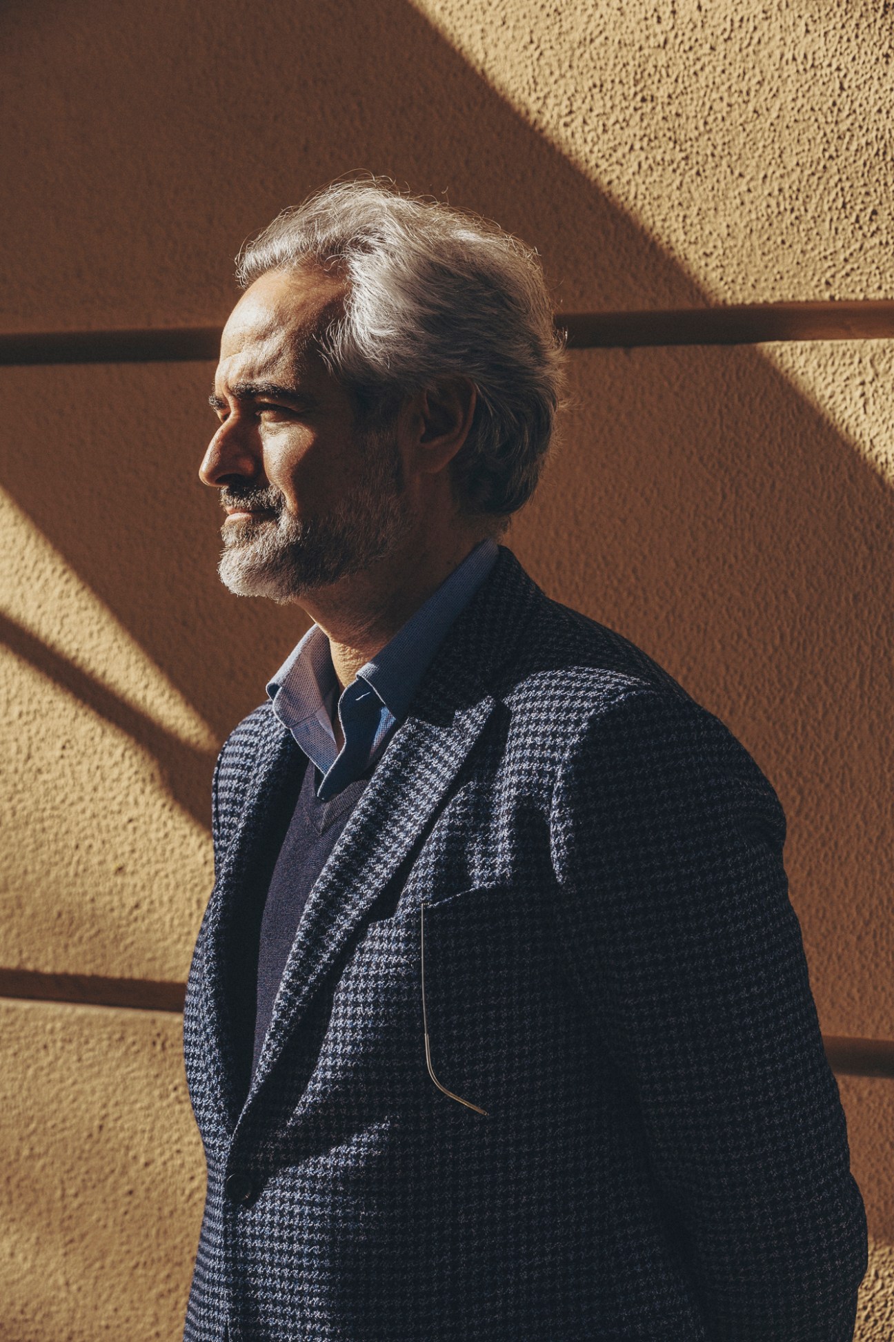 Carlos Baranda, CEO of Glent Shoes, in profile wearing a patterned blazer