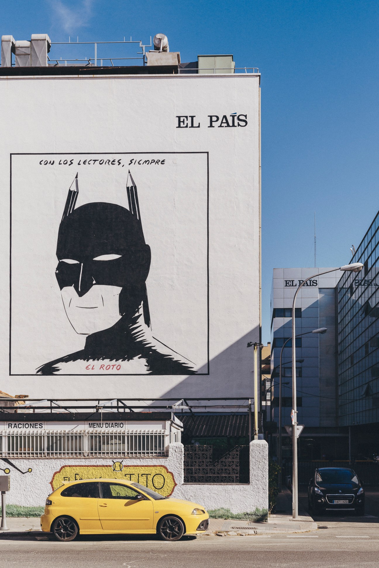 El País newspaper headquarters building with white facade and company logo