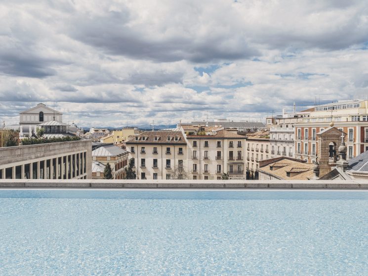 Large rooftop swimming pool at The Madrid Edition with city views