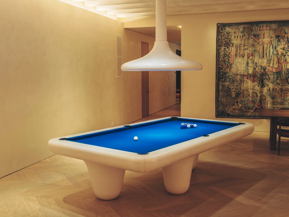 Game room with pool table at The Madrid Edition hotel