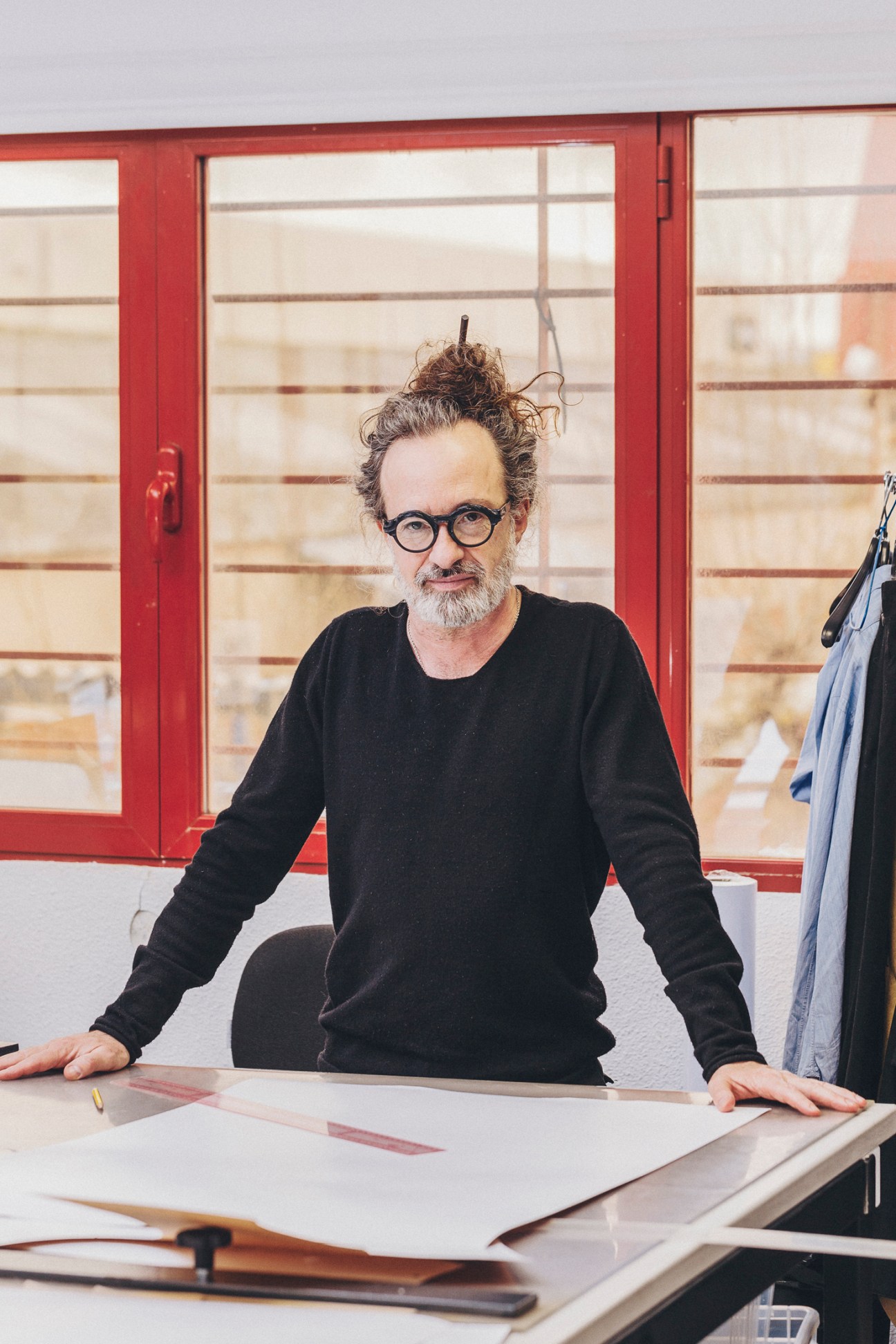 Dressmaker Javier Varas working on period costume construction in the workshop