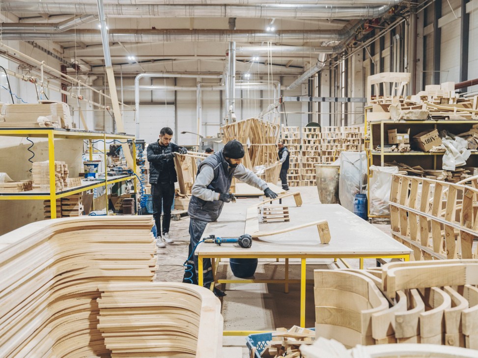 Workers on the factory floor at Gabba luxury furniture manufacturer