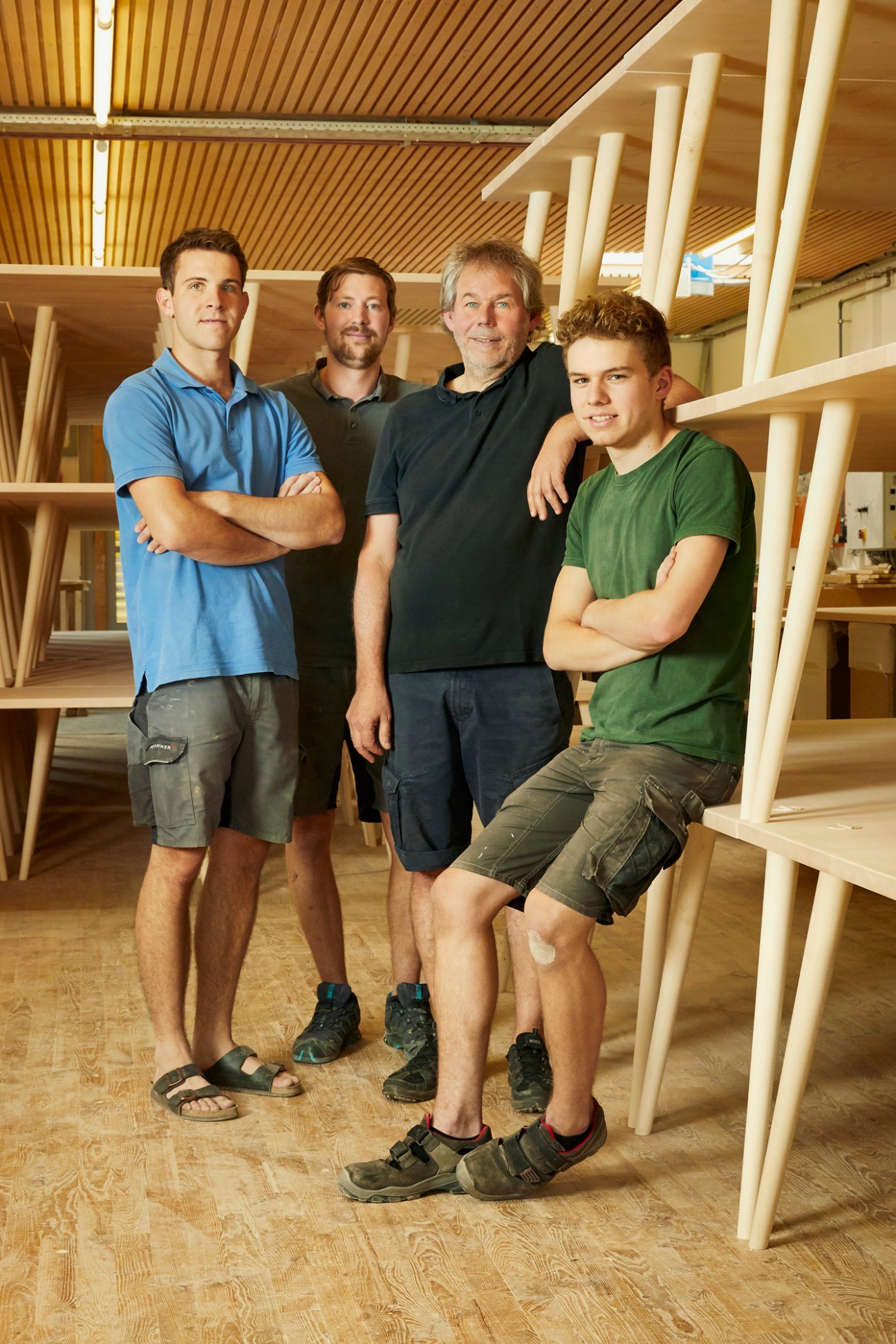Group photo of Wolfgang Schmidinger with his workshop team of craftspeople