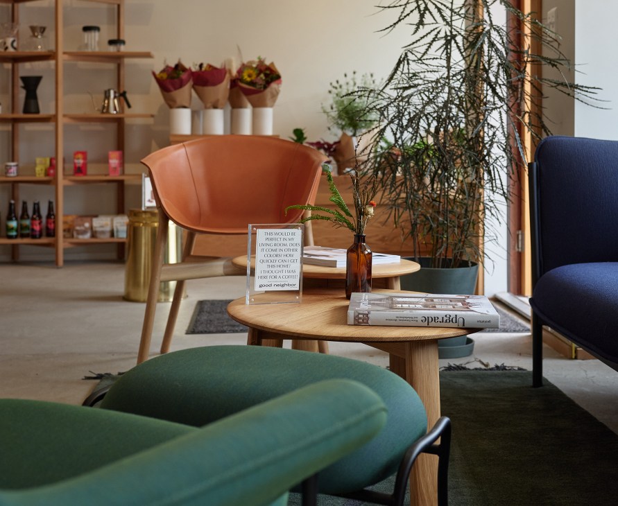 Interior of Good Neighbor shop displaying international design brands and local products on shelves