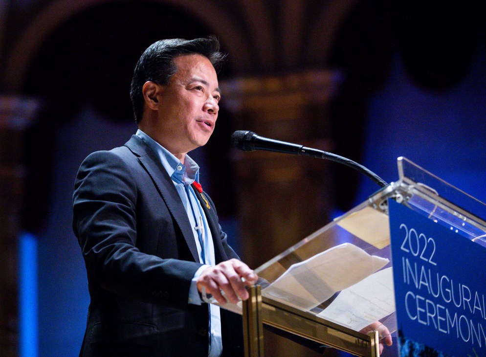 Ken Sim speaking at podium during 2022 inaugural ceremony