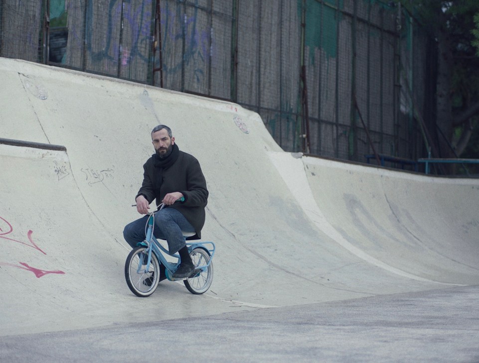Scene from the film Apples showing a person in contemplation