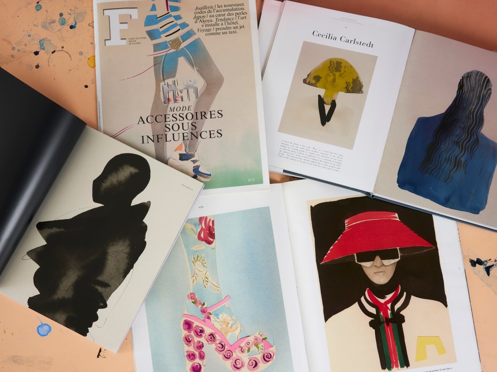 Collection of fashion illustrations and art books spread on a surface including works by Cecilia Carlstedt