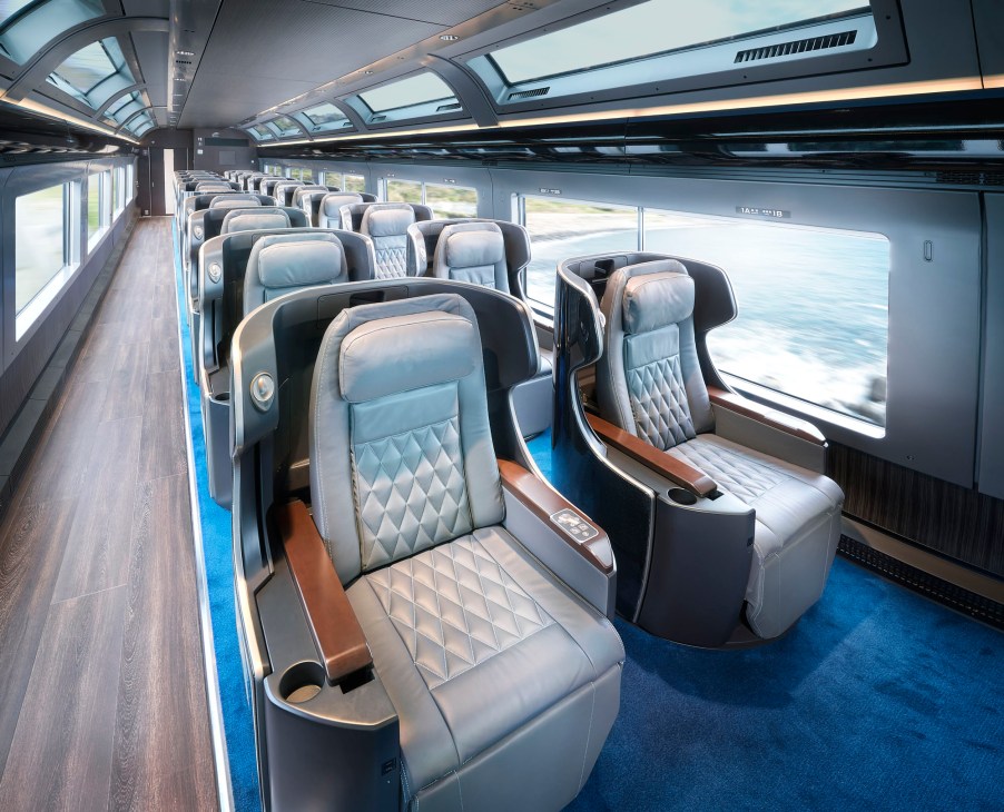 Premium Green carriage interior with quilted leather seats and large panoramic windows