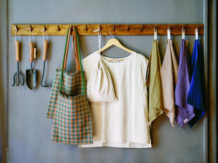 Display of functional homeware items including ceramics and textiles at Vicolo Via Mameli