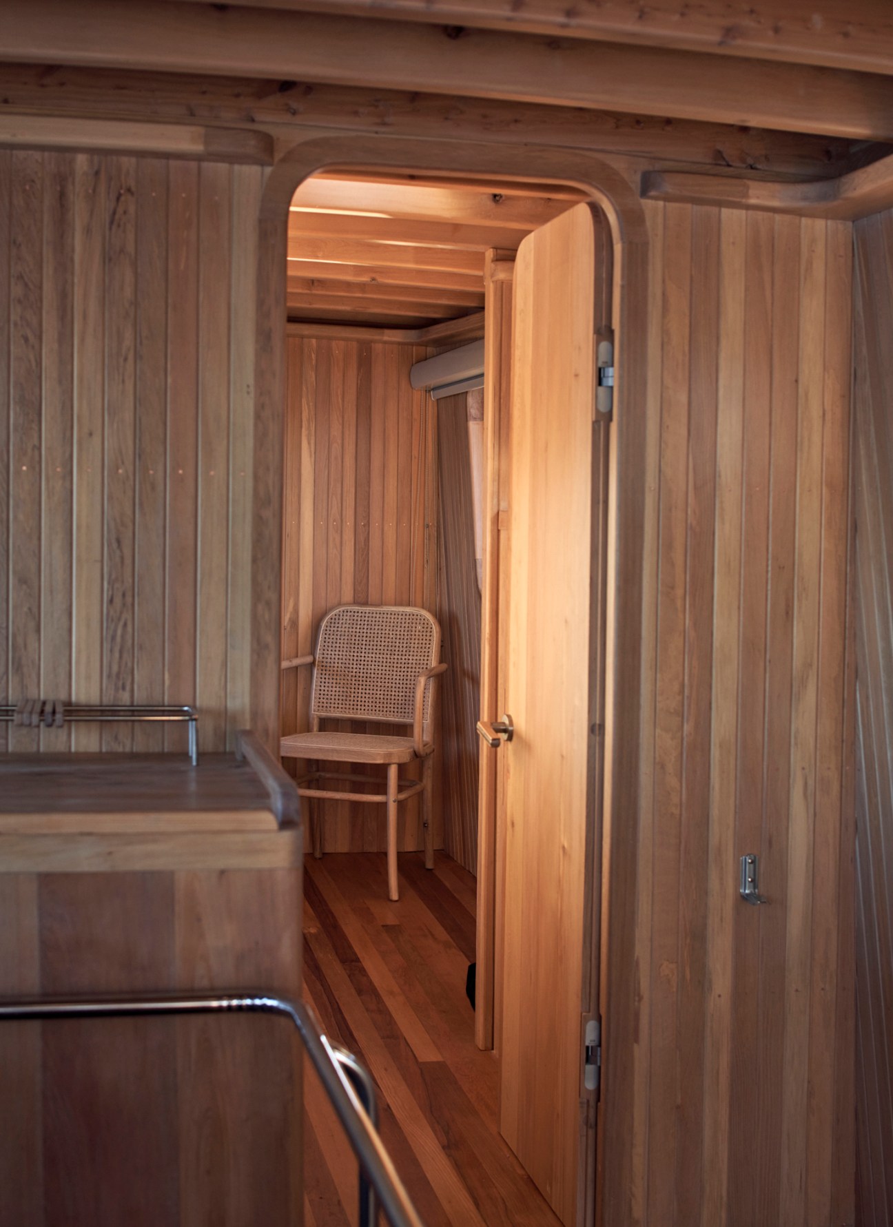 Close-up view of the custom timber interior detailing inside the restored boat