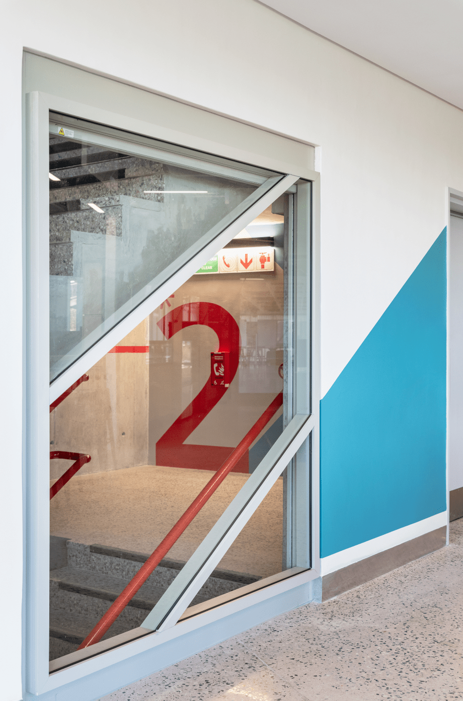 Exterior view of the glass building housing the Hasso Plattner D-School Afrika designed by kmh Architects