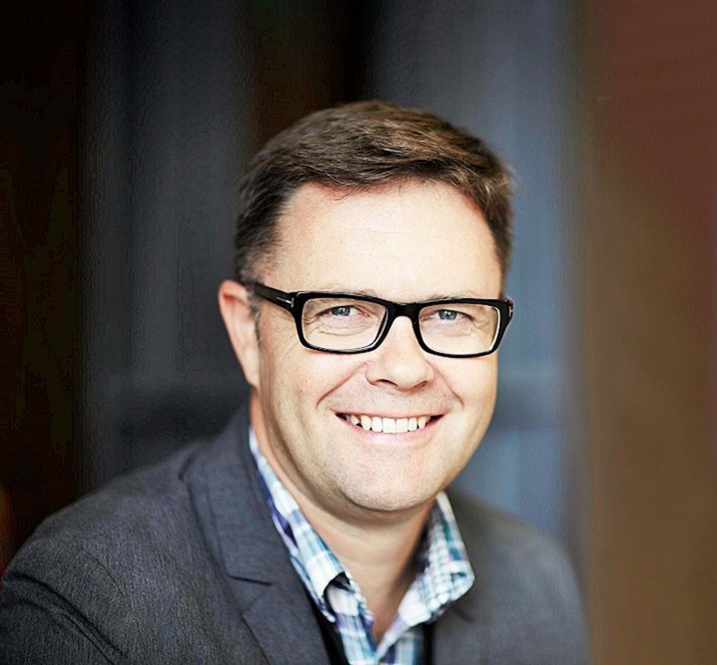 Portrait photograph of David Roberts, founder of UK property developer Igloo.