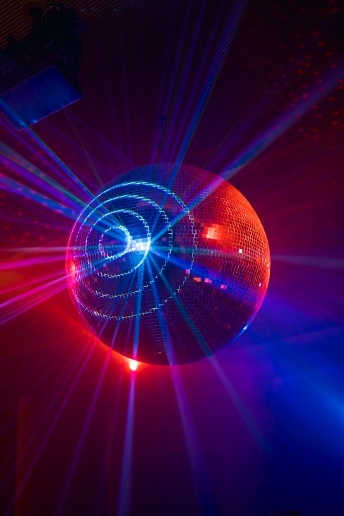Klymax's large disco ball illuminating the club