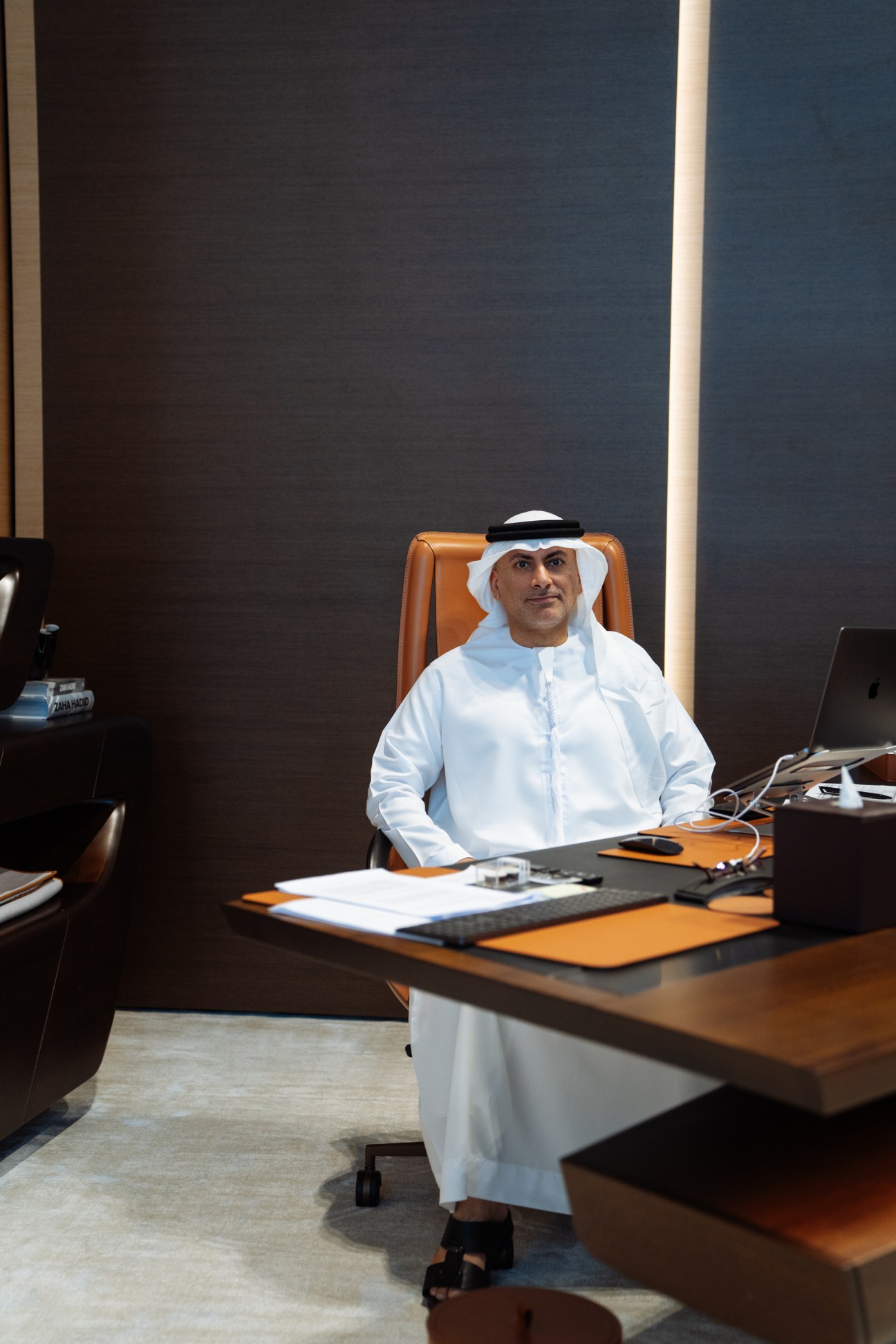 Khaled Al Huraimel, CEO of Beeah, seated at his custom-designed desk in his office.