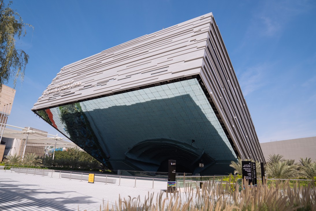 Saudi Arabia Pavilion, a modern angular building with horizontal striped metallic cladding and glass facade at Expo City Dubai.
