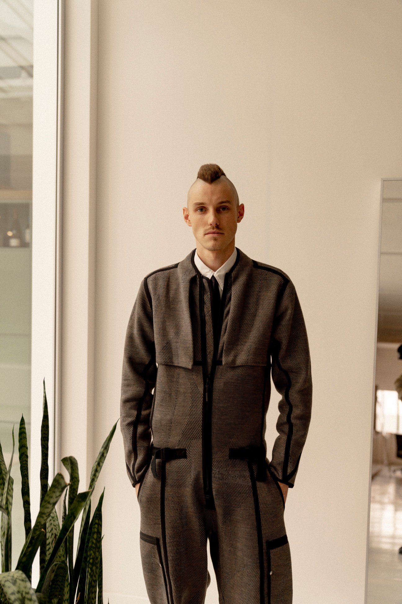 Byborre staff member wearing a technical overall garment in the studio workspace