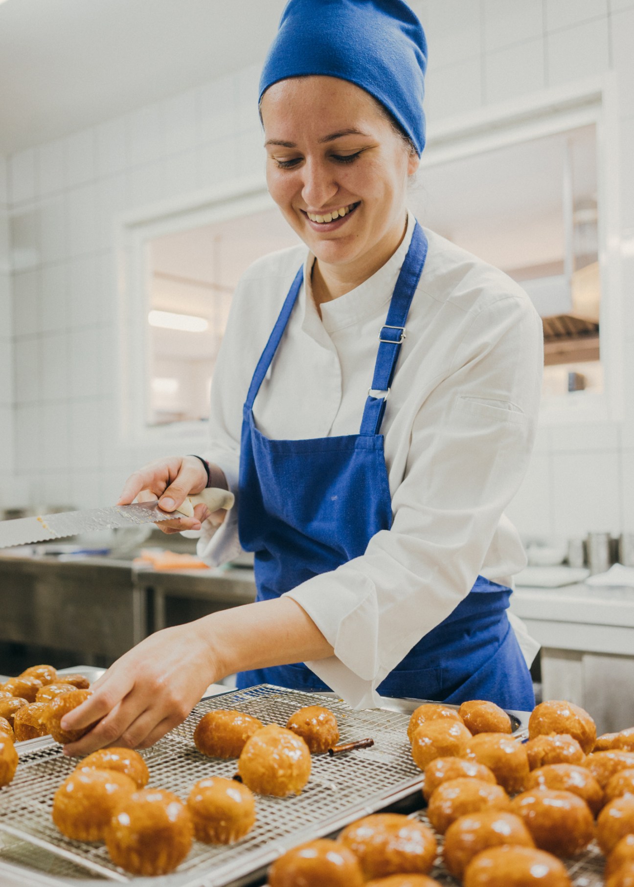 Pastry chef Despoina Georgiadou preparing loukoumades in Makryammos hotel kitchen
