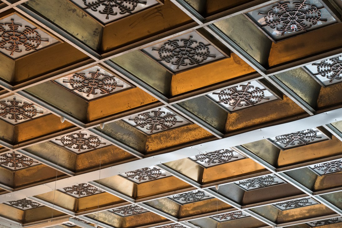 Elaborate decorative ceiling with moldings and painted details at the Kaunas Tadas Ivanauskas Museum of Zoology