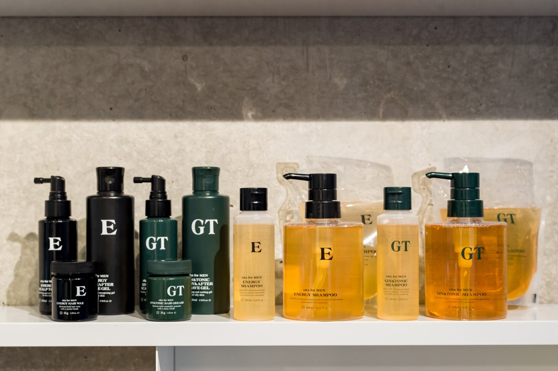 Men's hair care products from Japanese beauty brand Uka displayed on white shelf