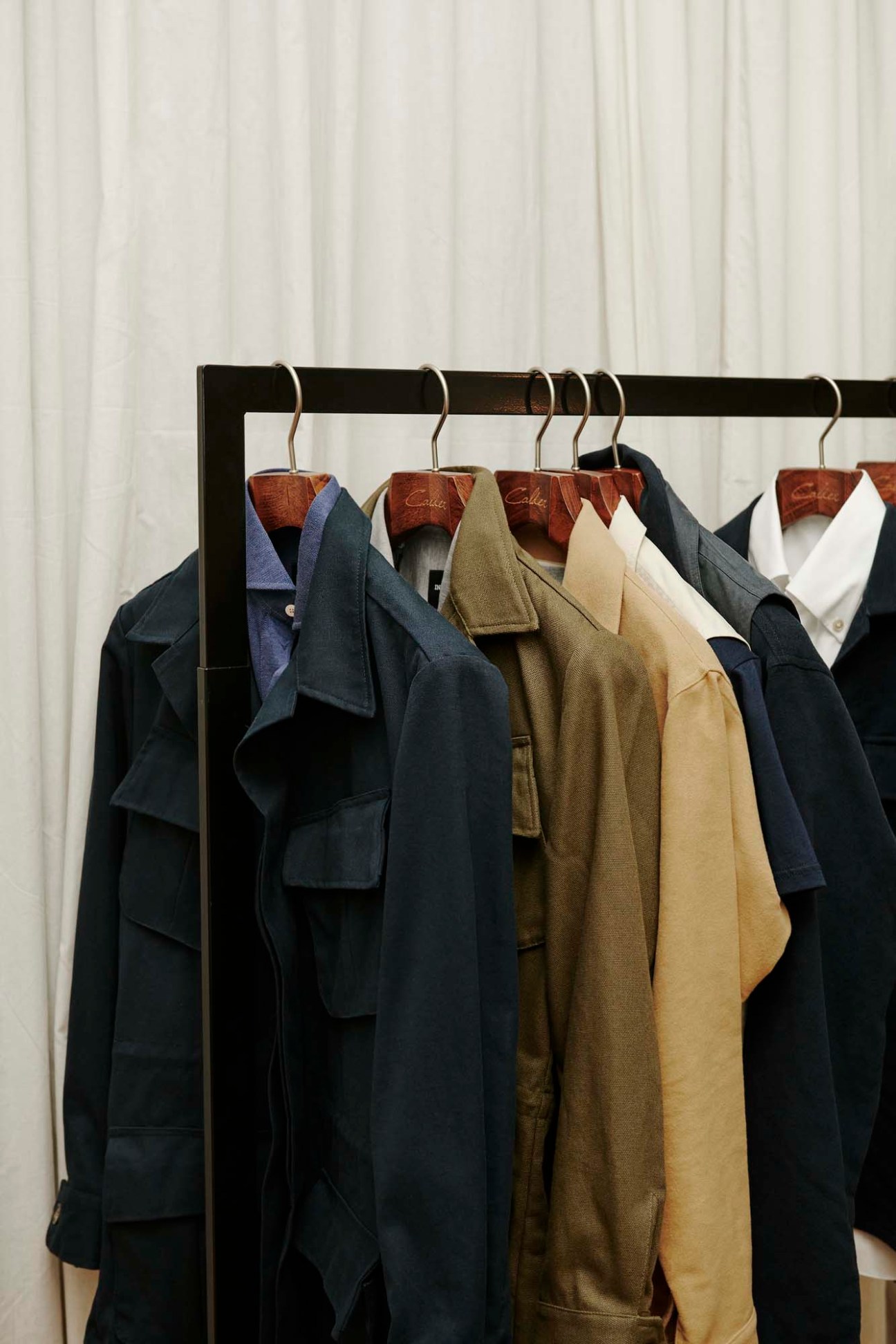 Informale's smart menswear selections including tailored pieces and accessories on display