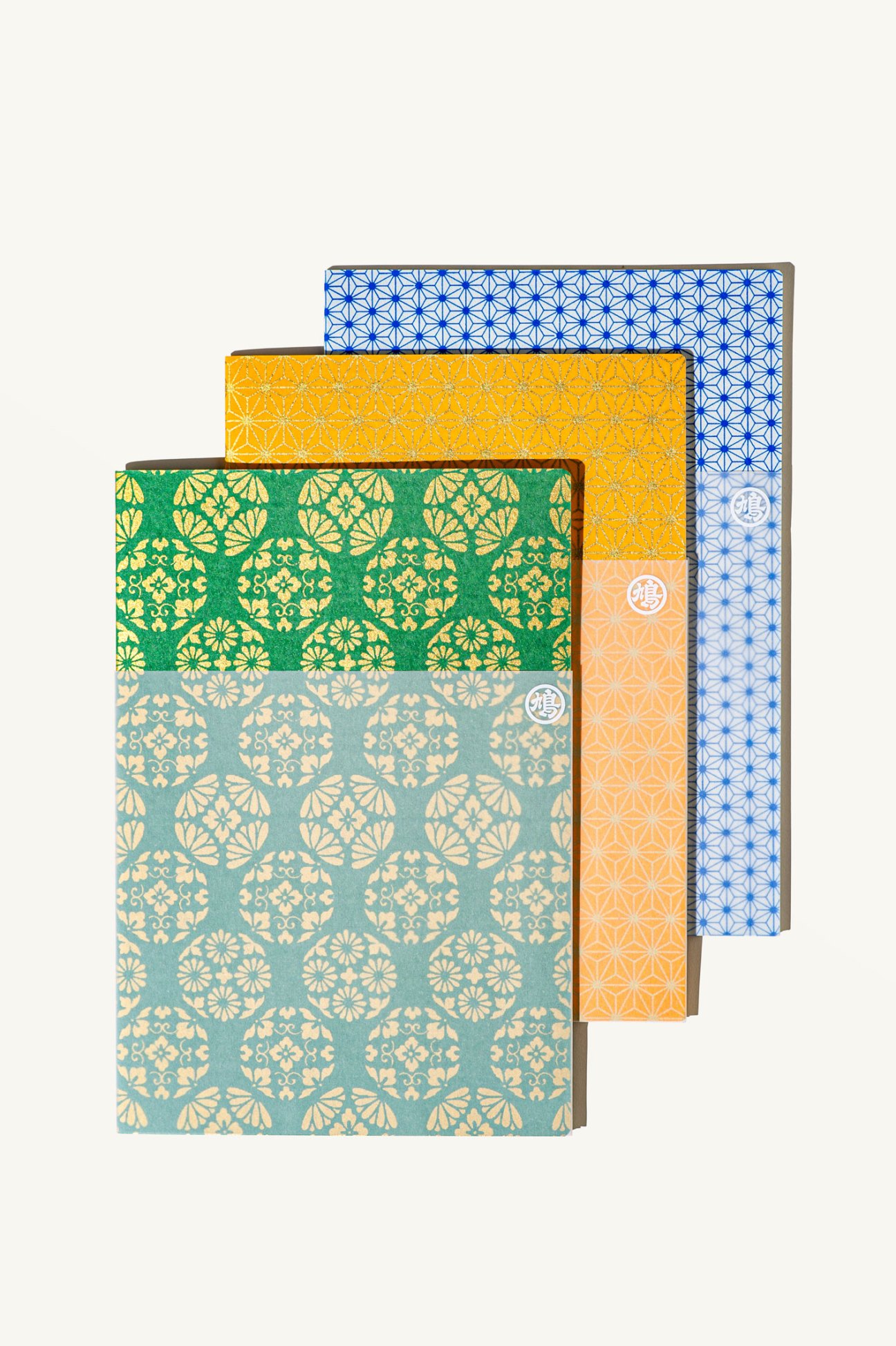 Collection of A6 notebooks bound with decorative Kyochiyo paper featuring traditional Kyoto patterns and designs