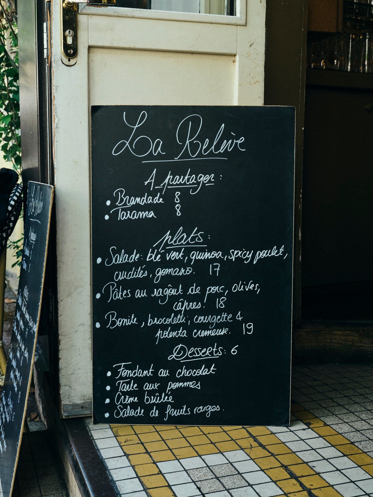 Daily changing menu board at La Relève restaurant
