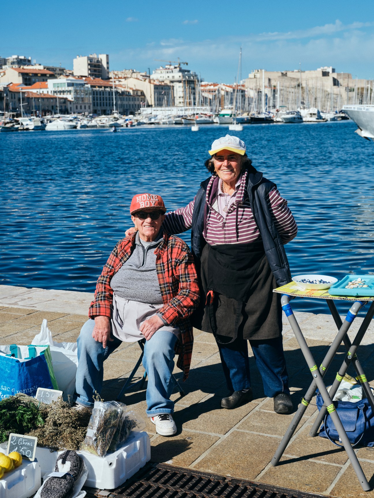 Fish vendors selling fresh catch at Marseille's old port